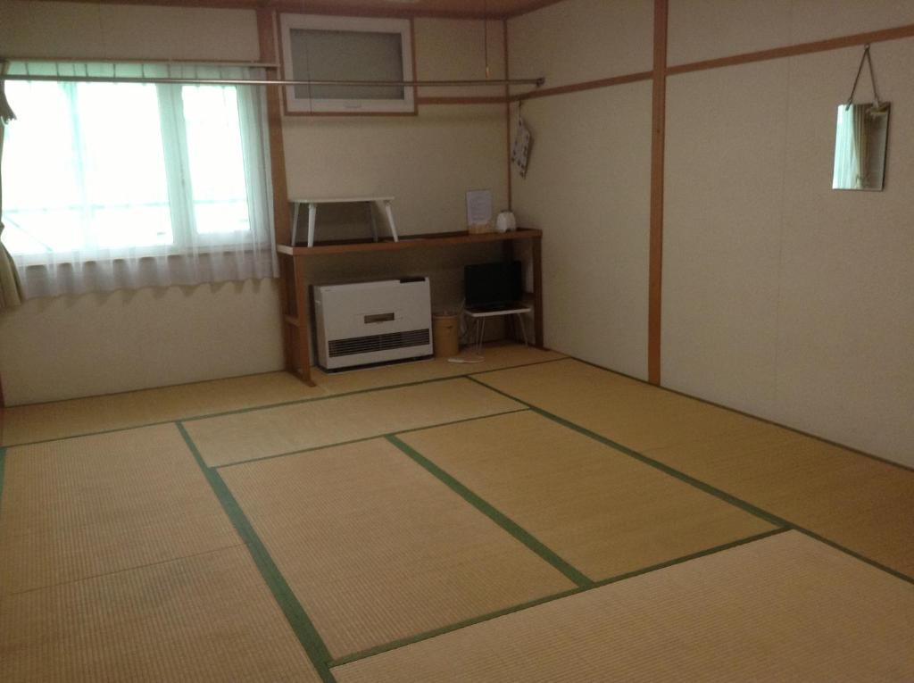 Minshuku Akiba Hotell NakaNakafurano Rum bild